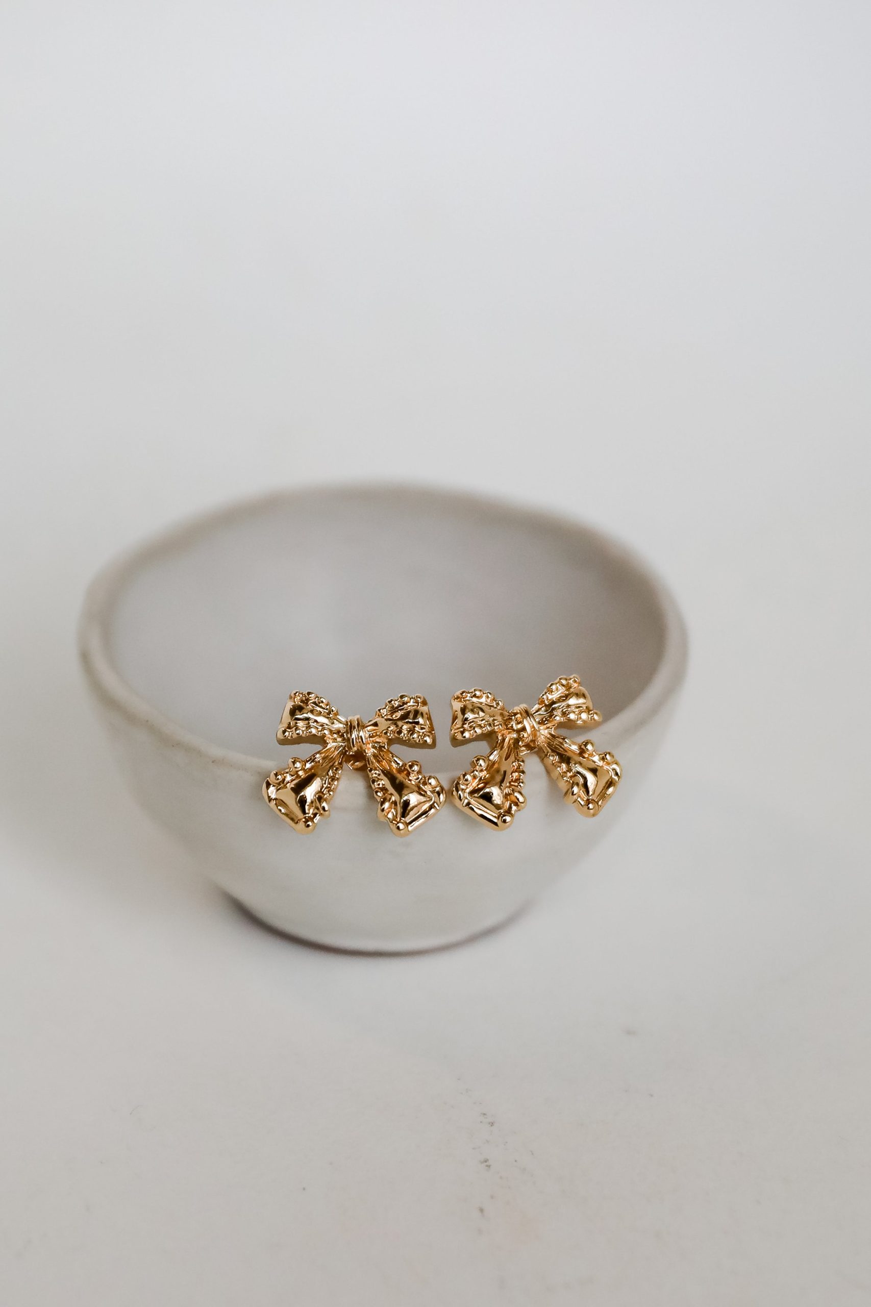 shopdressup_gold_bow_earrings_dbaaedbe-6a24-4d06-9a76-227bf9e3454a.jpg