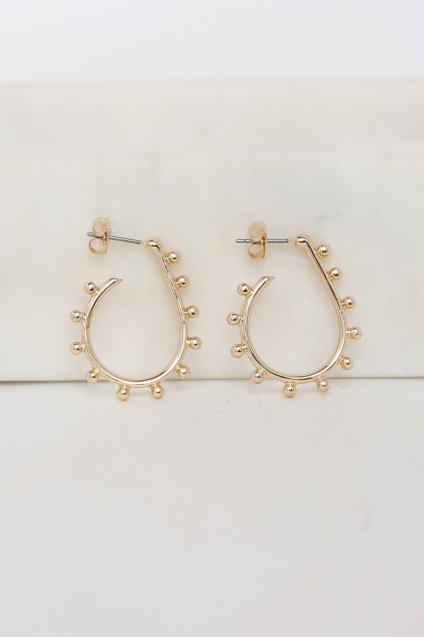 shopdressup_gold_hoop_earrings_31c85fe7-3be1-4ea1-9596-9ac7647b8e63.jpg