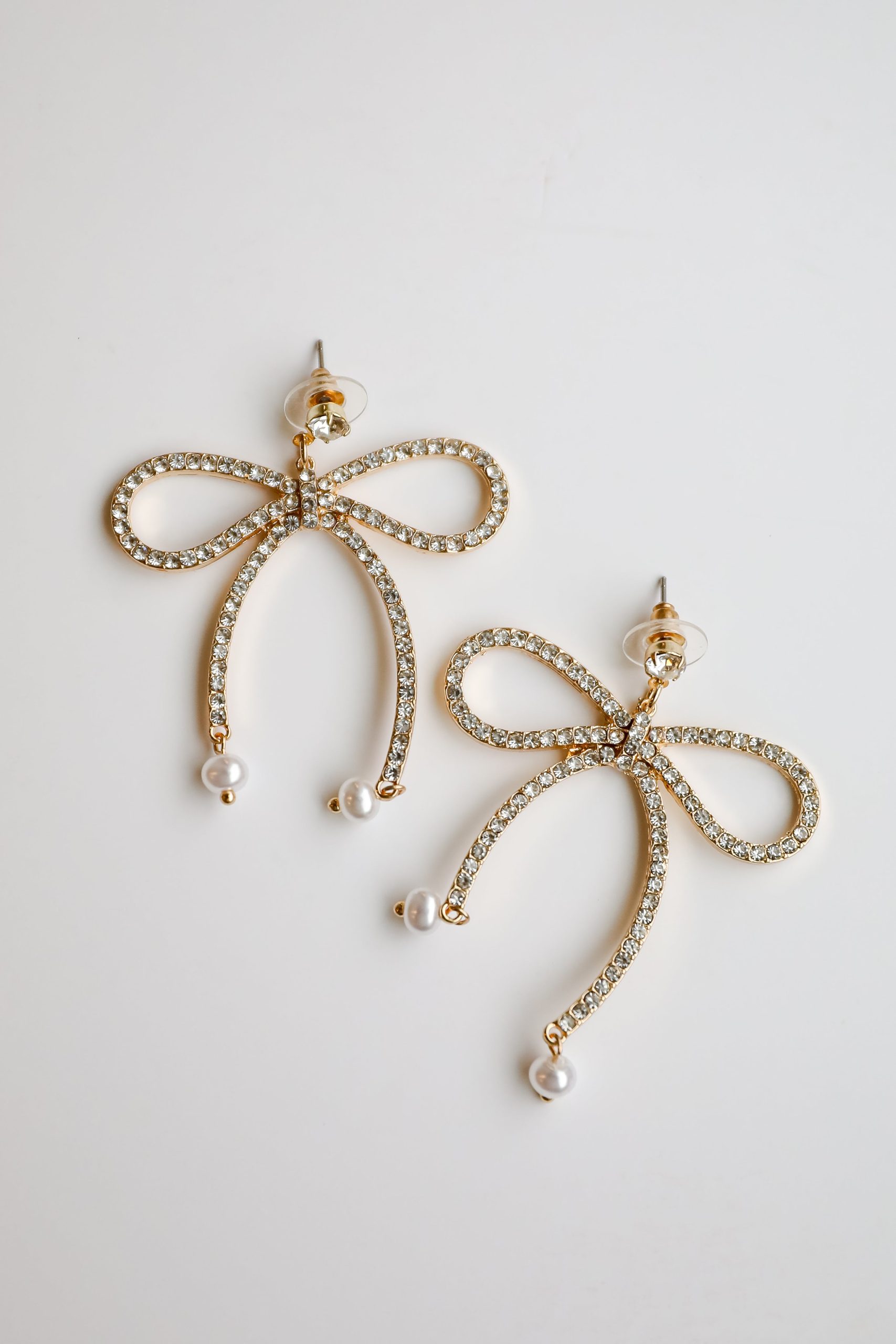 shopdressup_gold_rhinestone_bow_drop_earrings-4.jpg