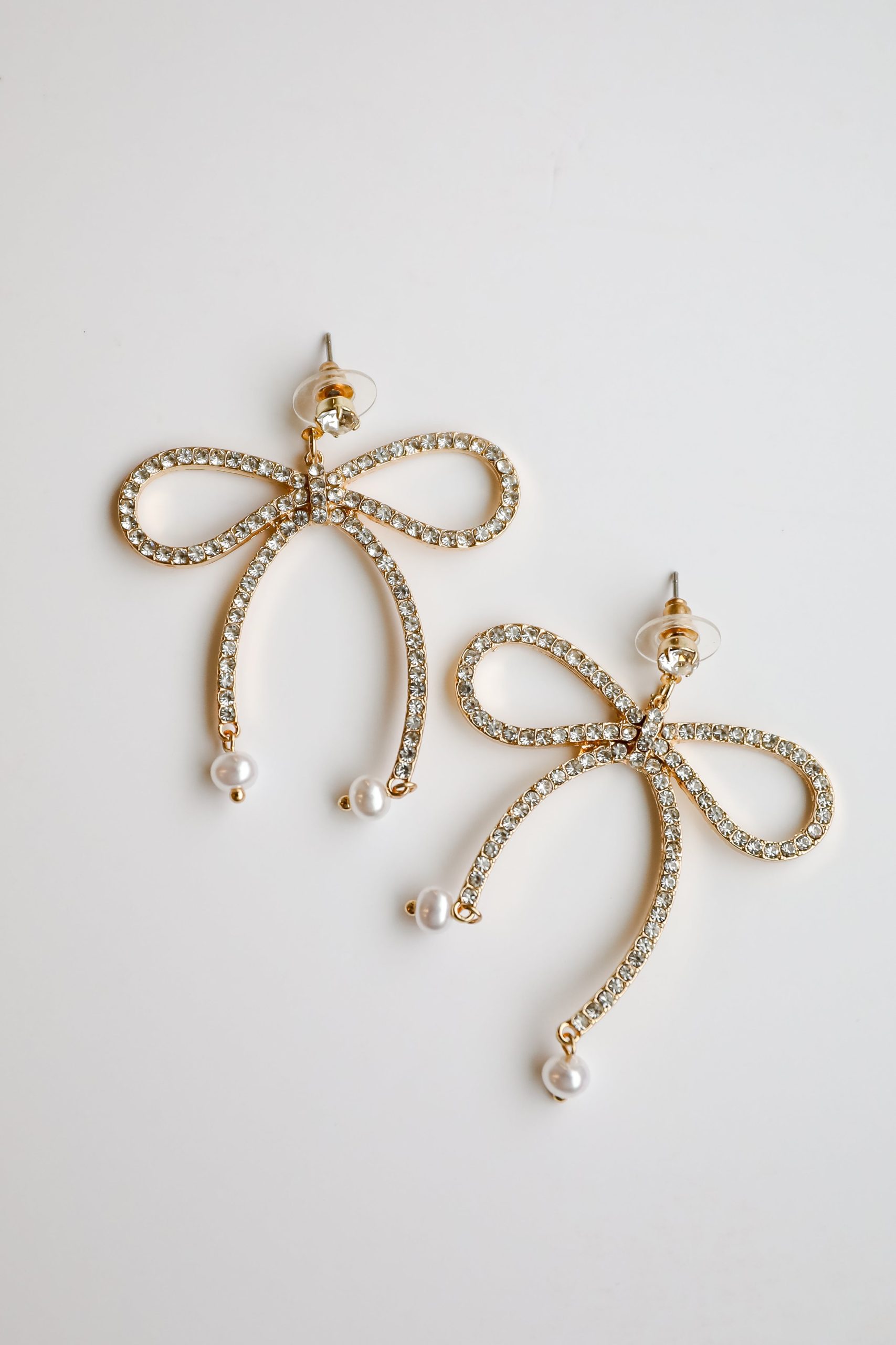 shopdressup_gold_rhinestone_bow_drop_earrings-5.jpg